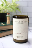 Cranberry Apple Spice scented soy candle handmade in a repurposed wine bottle